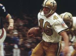 saints white jersey with gold numbers