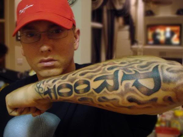 eminem tattoos mariah. eminem tattoos of his daughter. New Celebrity Tattoo Designs